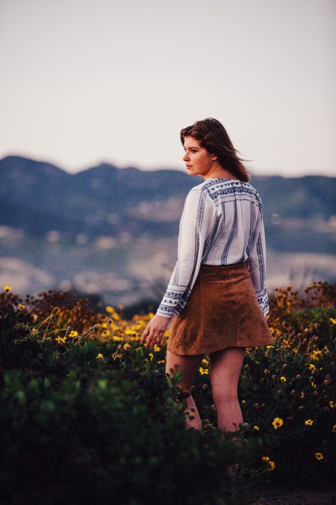 woman wearing brown miniskirt