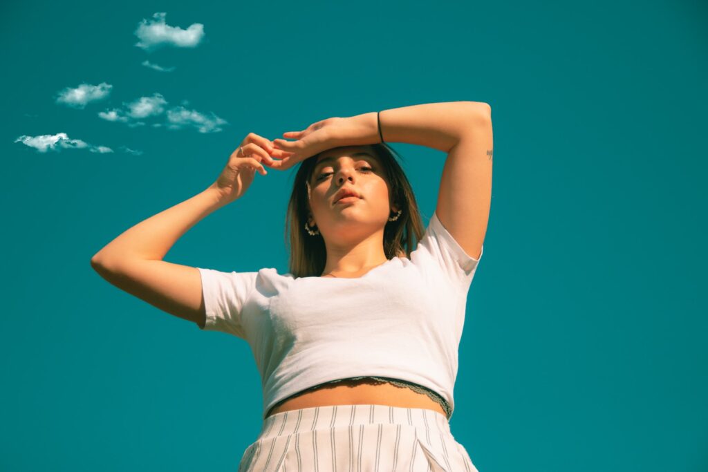 woman in white shirt and white skirt