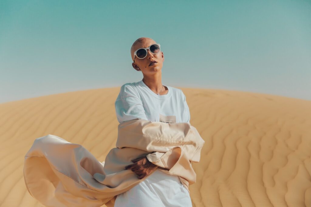 person standing on desert during daytime