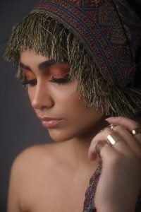 woman with black and white headdress