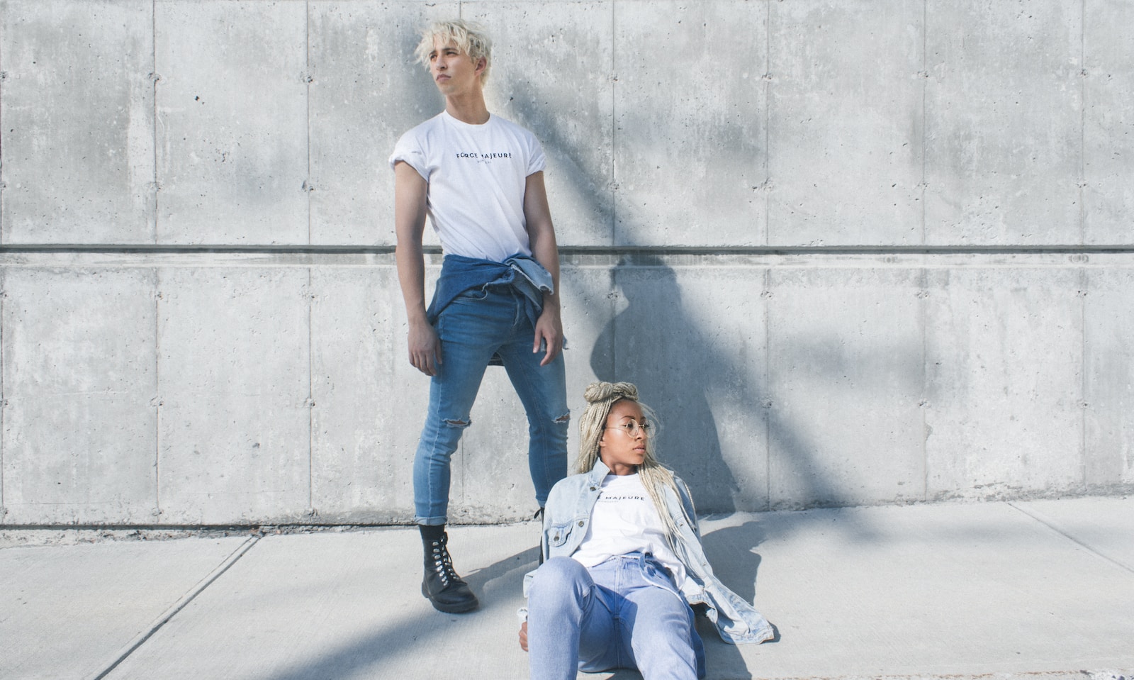 woman and man posing for photoshoot