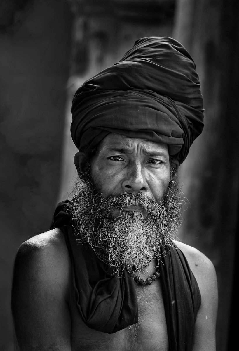man wearing black turban hat